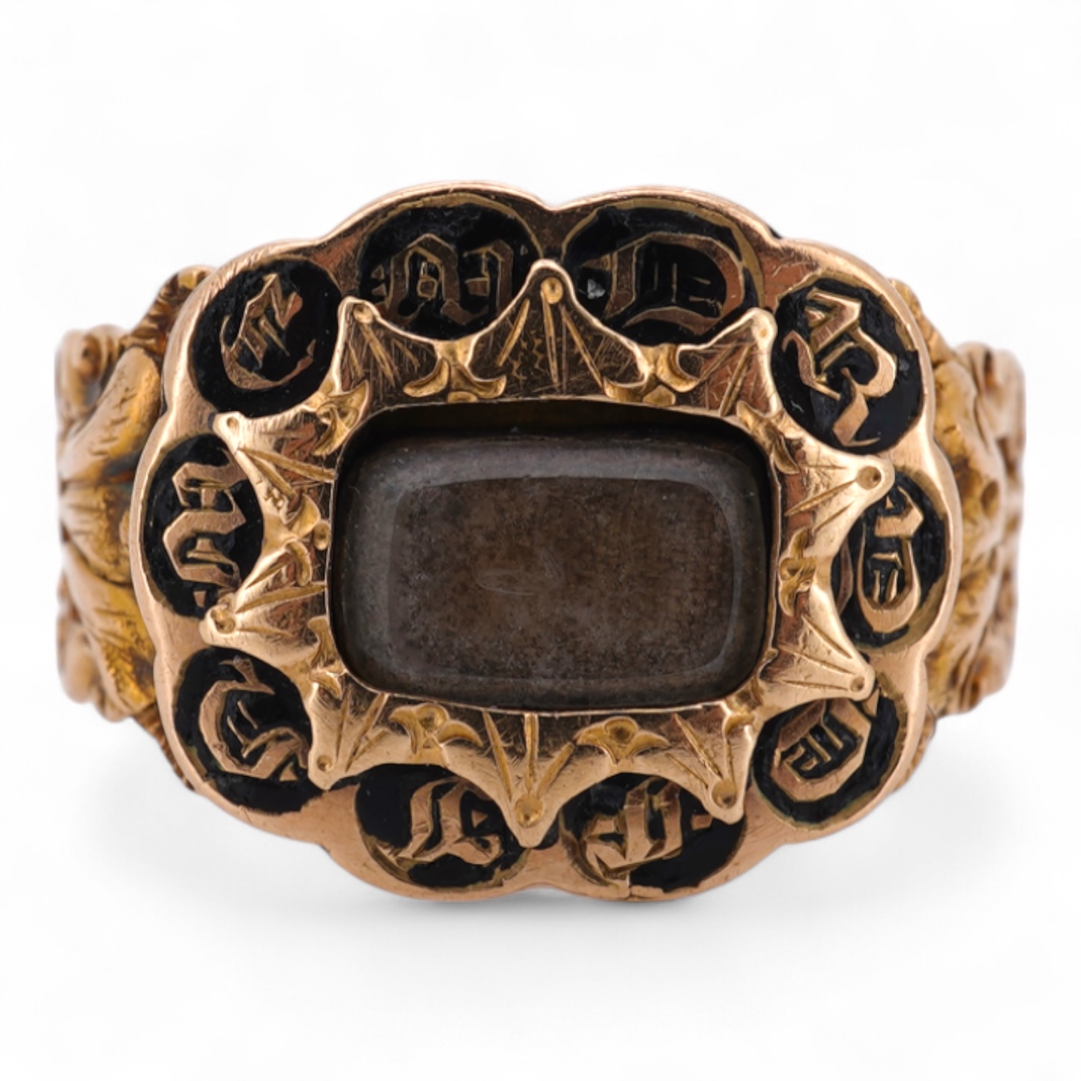 A William IV 18ct gold and black enamel 'In Memory' mourning ring, with hair beneath a central glazed panel, size N, gross weight 2.8 grams.